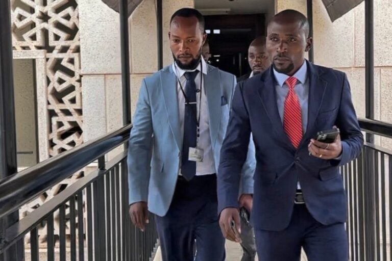 Ashaba-Vincent-with-Abraham-Luzzi-at-Parliament